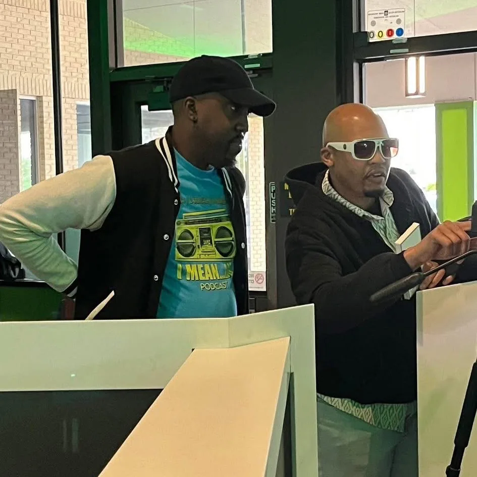 Production collaborators reviewing work at a location