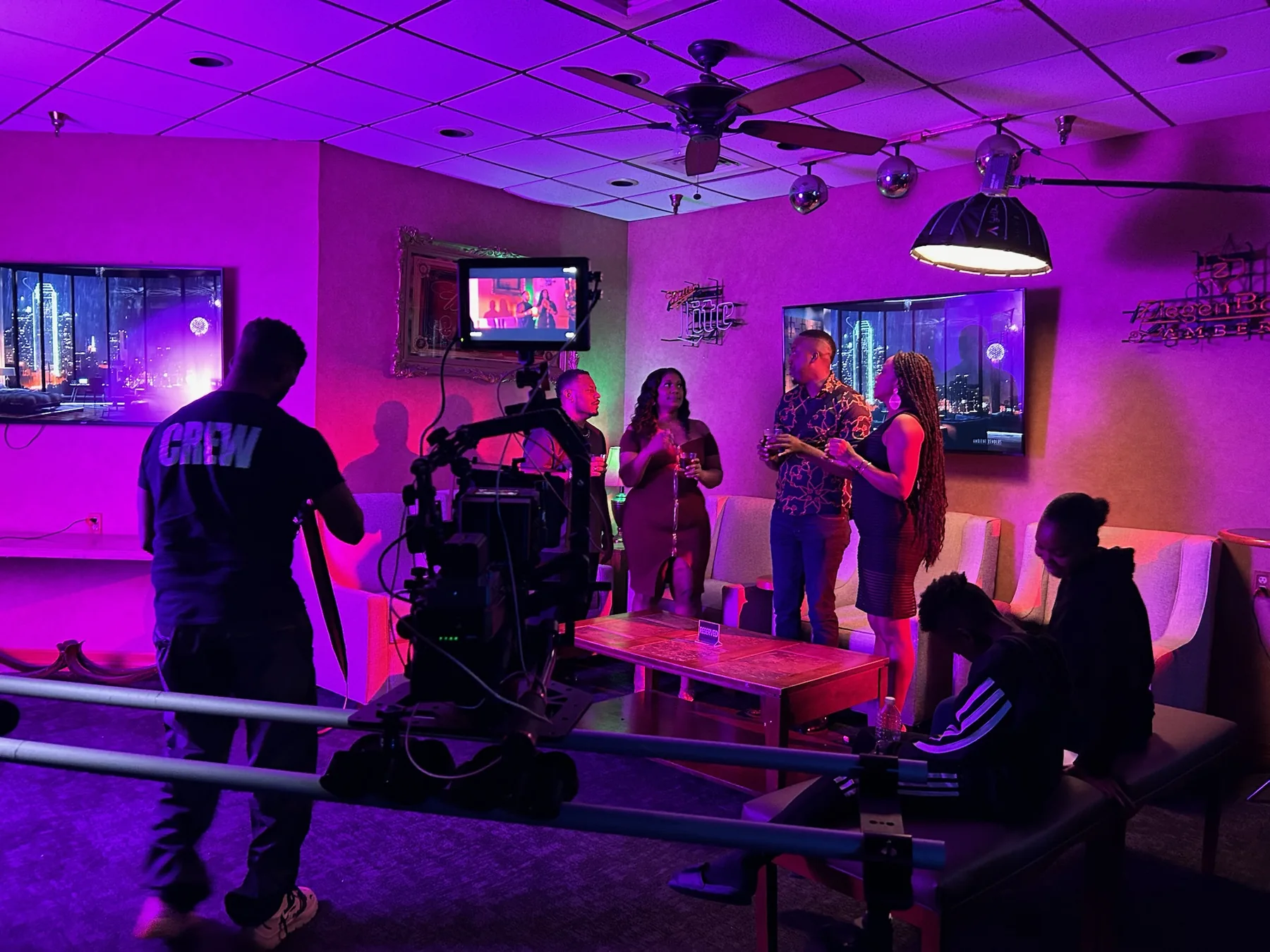 Camera crew filming a scene on set