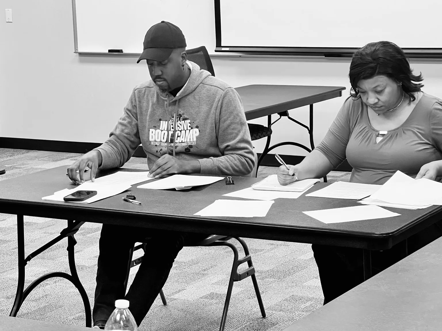 CORTA reviewing pages during an intensive workshop